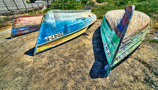 old boats upside down on cabo verde
