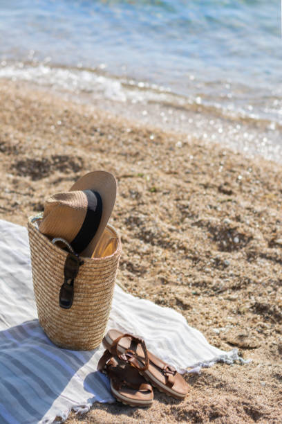 istock Beach bag and accessories. Beach vacation on a tropical beach 1459703979