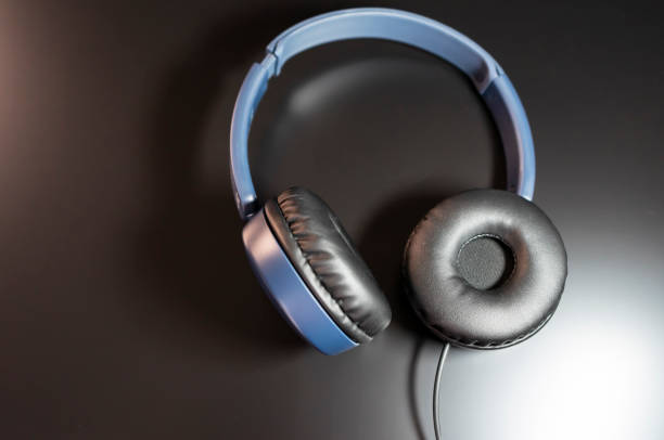 blue headphones with dark background