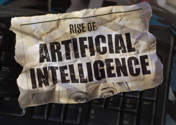 Torn-out newspaper headline about the rise of artificial intelligence stock photo