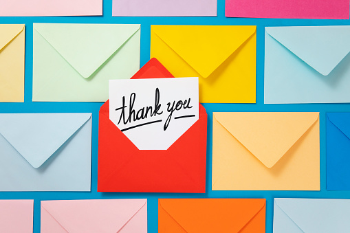 Handwriting Thank you note in red envelope