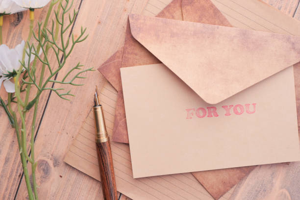 istock for you word in a paper with envelope on table 1459719634