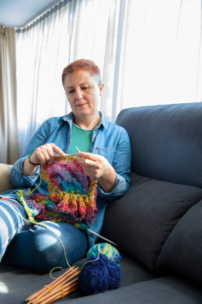 istock Mature Woman Knitting Wool 1459723526