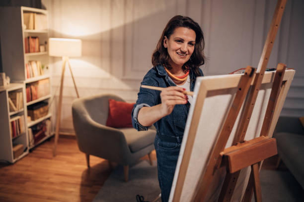 istock Female artist painting 1459723613