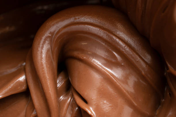 istock melted chocolate pouring and stirring 1459724809
