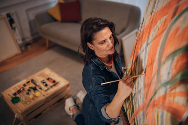 istock Female artist painting 1459725021