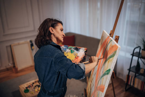 istock Female artist painting 1459725065