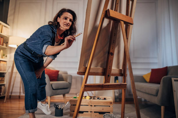 istock Woman painting 1459728214