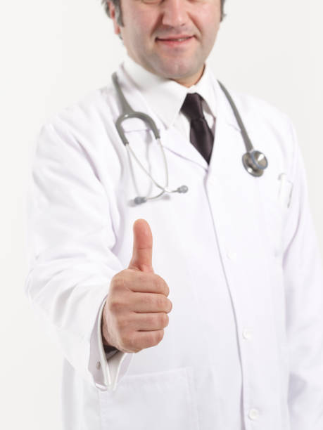 istock Doctor holding his thumb up 1459736460