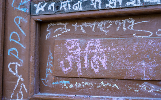 People starting to write on wall around the temple during Saraswati Puja occasion at Kathmandu, Nepal, on  Thuesday January 26, 2023