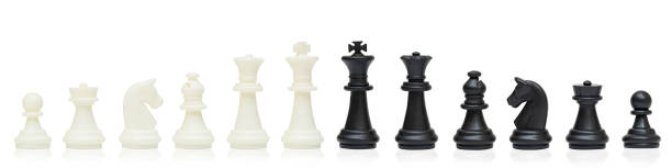 istock All chess are in a row on a white background 1459741085