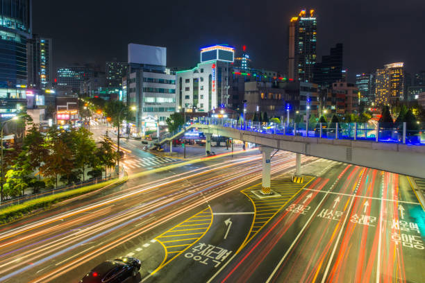 istock Seoul light trails rush hour traffic highrise highways night Korea 1459741113