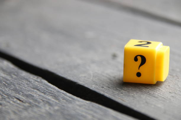 istock Question mark on a wooden background.. 1459745081