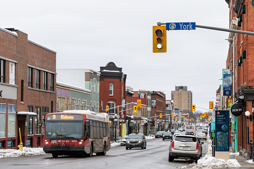 Ottawa, Canada - January 23, 2023: City view with traffic on York Street in downtown of the city. Bus on road
