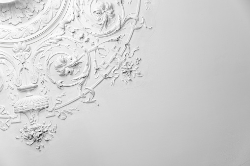 White gypsum bas-relief ceiling design elements in rococo style, classic architecture abstract template