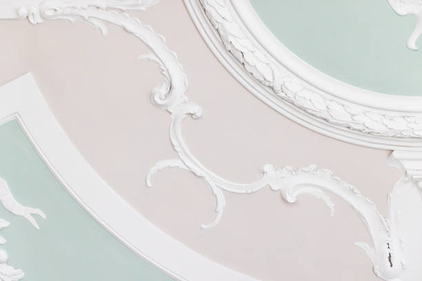 istock White gypsum bas-relief details, ceiling design, rococo style 1459748556
