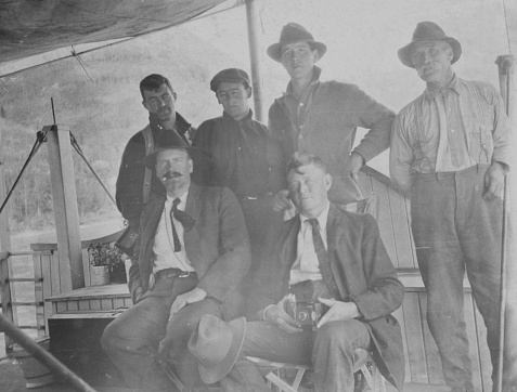 Peace River, Alberta, Canada - 1914. Group of men aboard a paddle steamer boat on the Peace River in Alberta, Canada. They are traveling from the town of Peace River to Hudsons Hope in British Columbia. The trip taking six days.