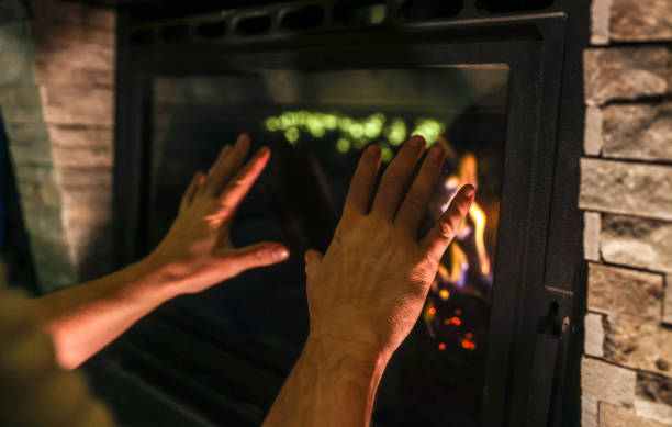 istock Male Hands by a Fireplace 1459749735