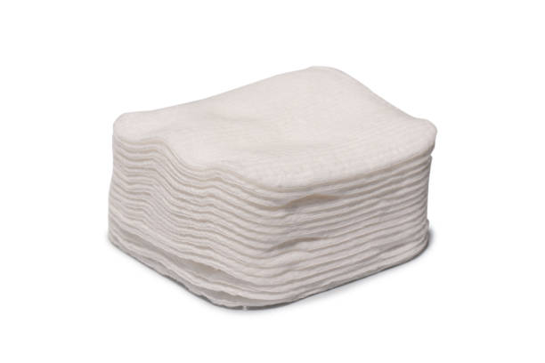 istock Stack of white cotton sponges isolated on a white background. 1459752003
