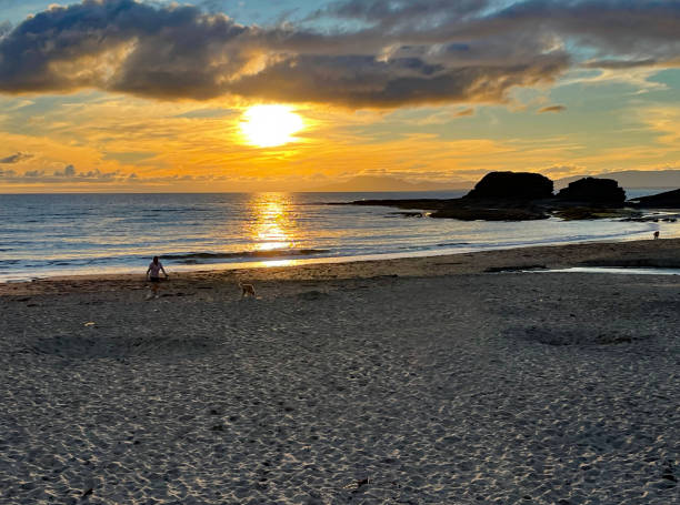 Bundoran bay in Co. Donegal, Ireland Sandy beach on sunset in Bundoran town, Co Donegal, Ireland the beach and coastline around bundoran in donegal ireland stock pictures, royalty-free photos & images