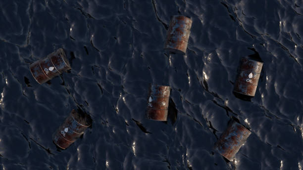 derramamento de óleo. conceito de óleo. barris de petróleo vazios na superfície do mar de petróleo. poluição química industrial. água preta. - oil slick flash - fotografias e filmes do acervo