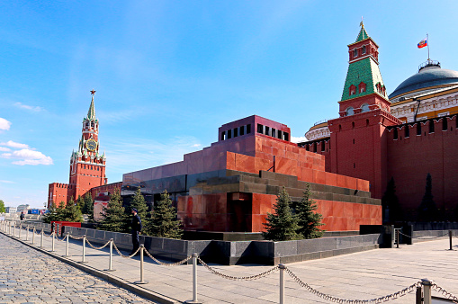 Bright view with famous tourist attraction and landmark and blue sky on a sunny day. Text in English - Lenin.