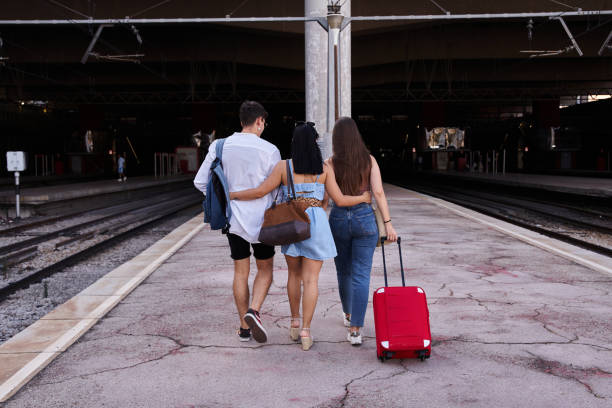 istock Friends walking through the station 1459766591