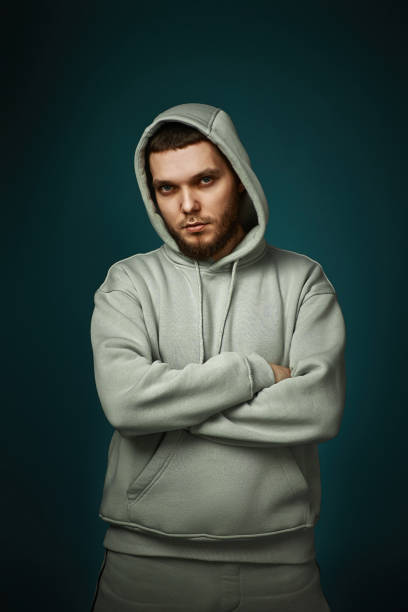 istock bearded man in sweatshirt on gray background. 1459767797