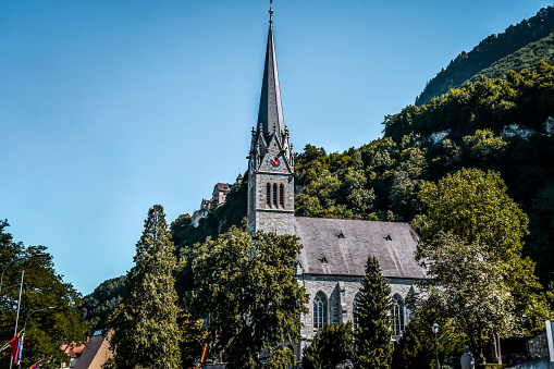 The main facade of Beauport Abbey, a roofless gothic building located in Paimpol, Cotes d'Armor, Brittany, France. August 2023, sunset view.