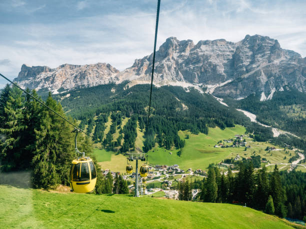 Overhead cable car in Italian Dolomites. Piz Sorega gondola lift.