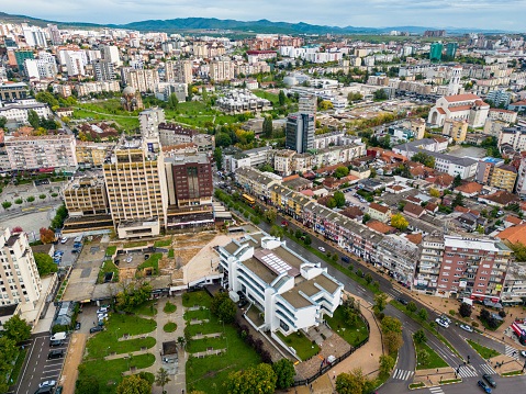 Pristina, Kosovo - September 29, 2022: Pristina Modern City Center and Residential Buildings. Aerial View over Capital of Kosovo. Balkans. Europe.