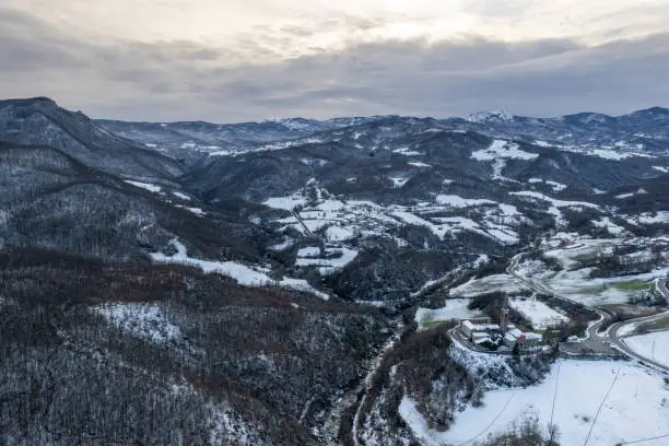 Photo of Drone view of Our Lady of Lourdes Grotto - Sperongia Parish - Morfasso, Piacenza, Emilia Romagna, Italy in winter