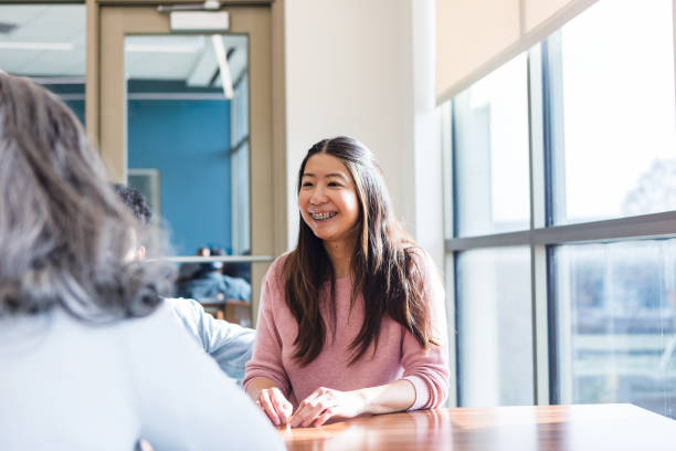 istock Young adult female smiling 1459782821