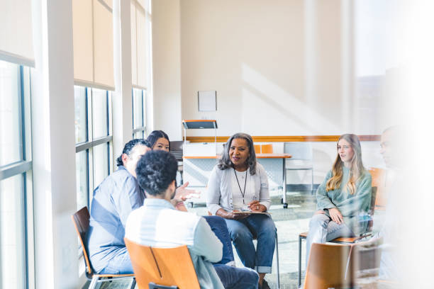 istock Diverse group of college students meet 1459782911