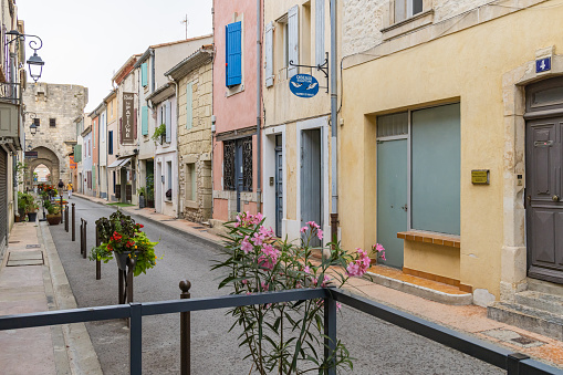 Aigues-Mortes, Gard, Occitania, France. July 4, 2022. Small walking street in Aigues-Mortes.