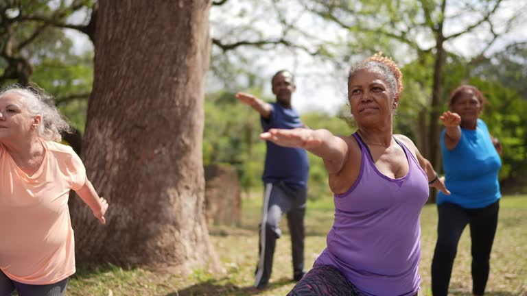 Group of senior people doing exercise in a park