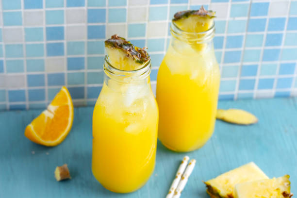 istock Tropical fruity drink with pineapple and orange 1459807227