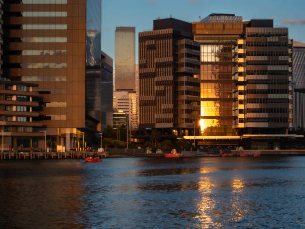 istock Urban skyline and river at sunset 1459812992
