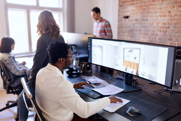 istock Successful team of business people in creative office 1459821586