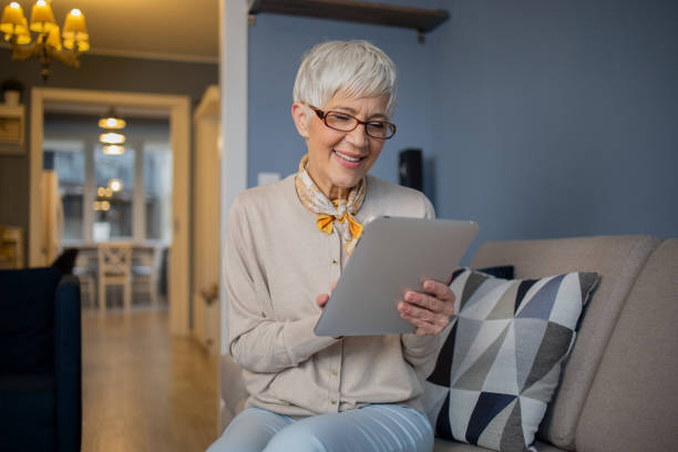istock Portrait of a senior woman using digital tablet 1459828075