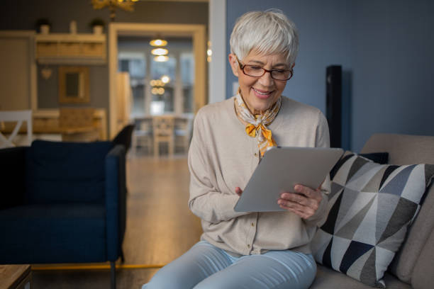istock Portrait of a senior woman using digital tablet 1459828125