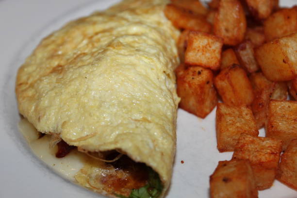 istock Omelette with Breakfast skillet Potatoes 1459829516