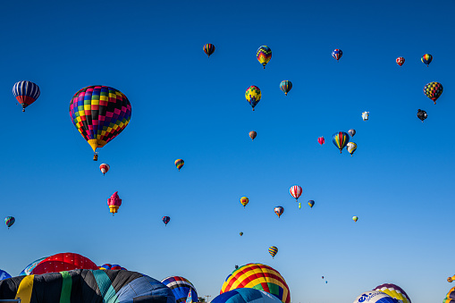 Albuquerque, New Mexico - USA - Oct 1, 2022: Hot air balloon mass ascension at the Albuquerque International Balloon Fiesta.