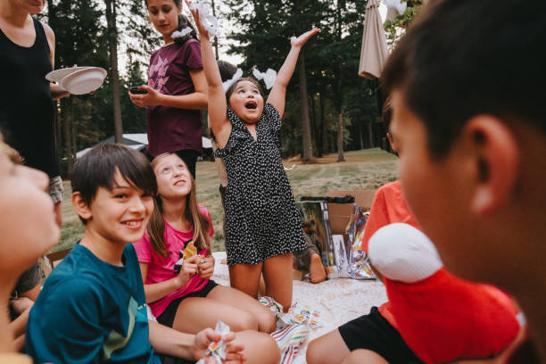 istock Opening birthday presents with friends 1459839751