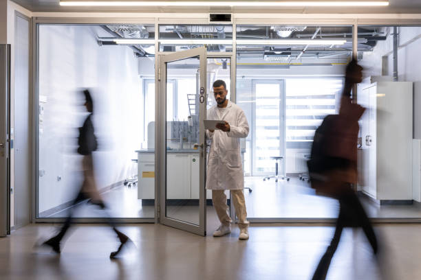 istock The laboratory assistant exits the laboratory. 1459839868