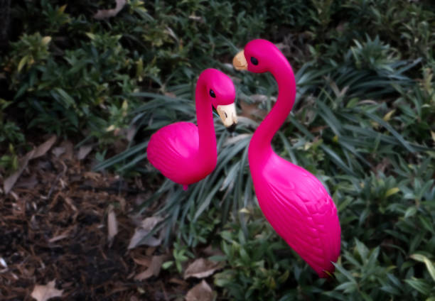 istock Two Pink Flamingo garden ornaments 1459850399
