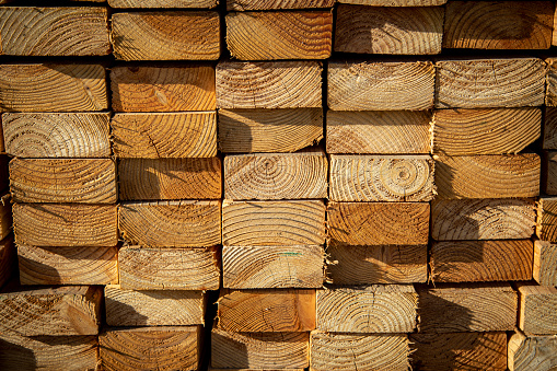 Lumber stacked at a housing construction site