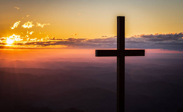 istock A Cross and the Rising Sun 1459853277