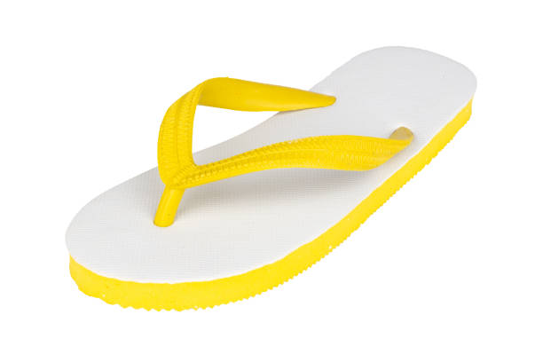 istock sandals  flip flops color yellow isolated on white background 1459854837