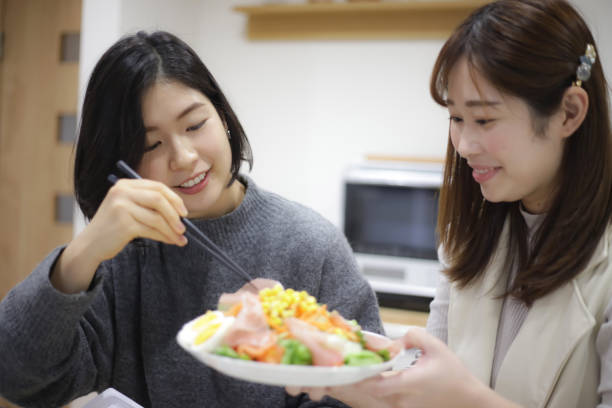 istock woman cooking 1459855083